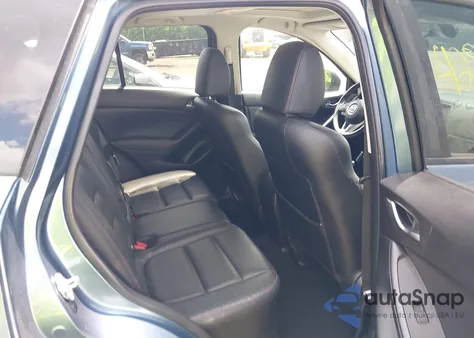 2015 Mazda Cx-5 Grand Touring z USA, uszkodzony, nr VIN JM3KE4DY5F0471689